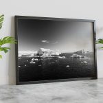 Black frame leaning on concrete floor Mockup